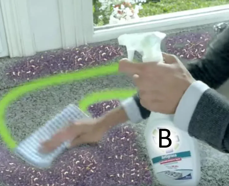 Fotogramma di una pubblicità di un disinfettante spray: una mano lo nebulizza su un tappeto, con una linea verde che delimita la zona trattata, contrassegnata con la lettera "B".